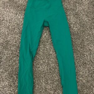 2 Pairs of leggings, and a pair of joggers.